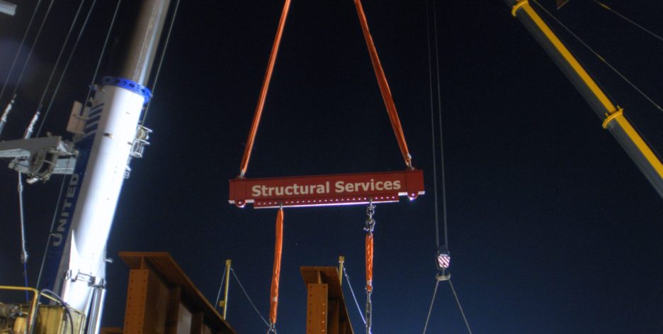 Structural Services branded equipment doing night work